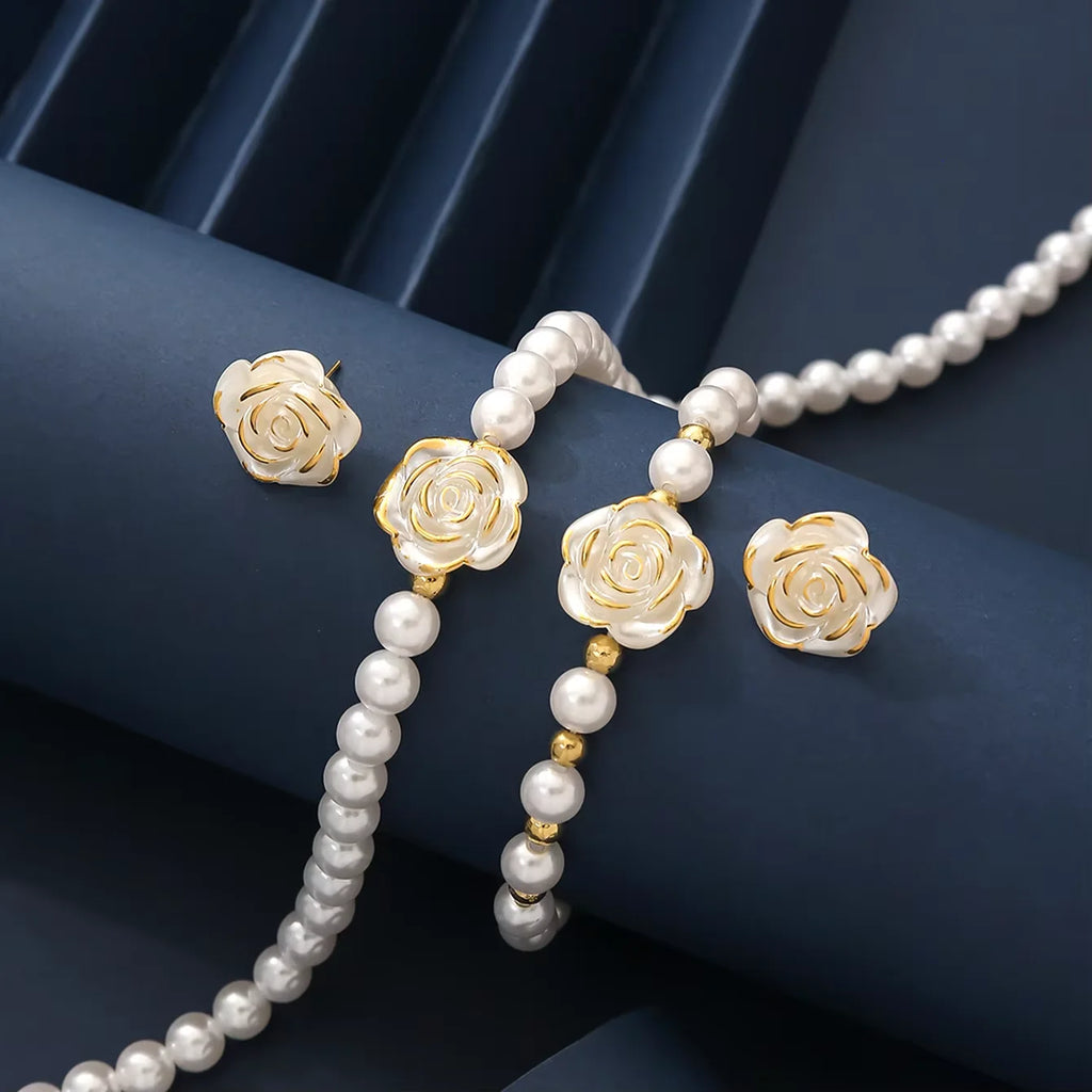 Elegant Pearl Flower Jewellery Set — Necklace, Bracelet & Earrings