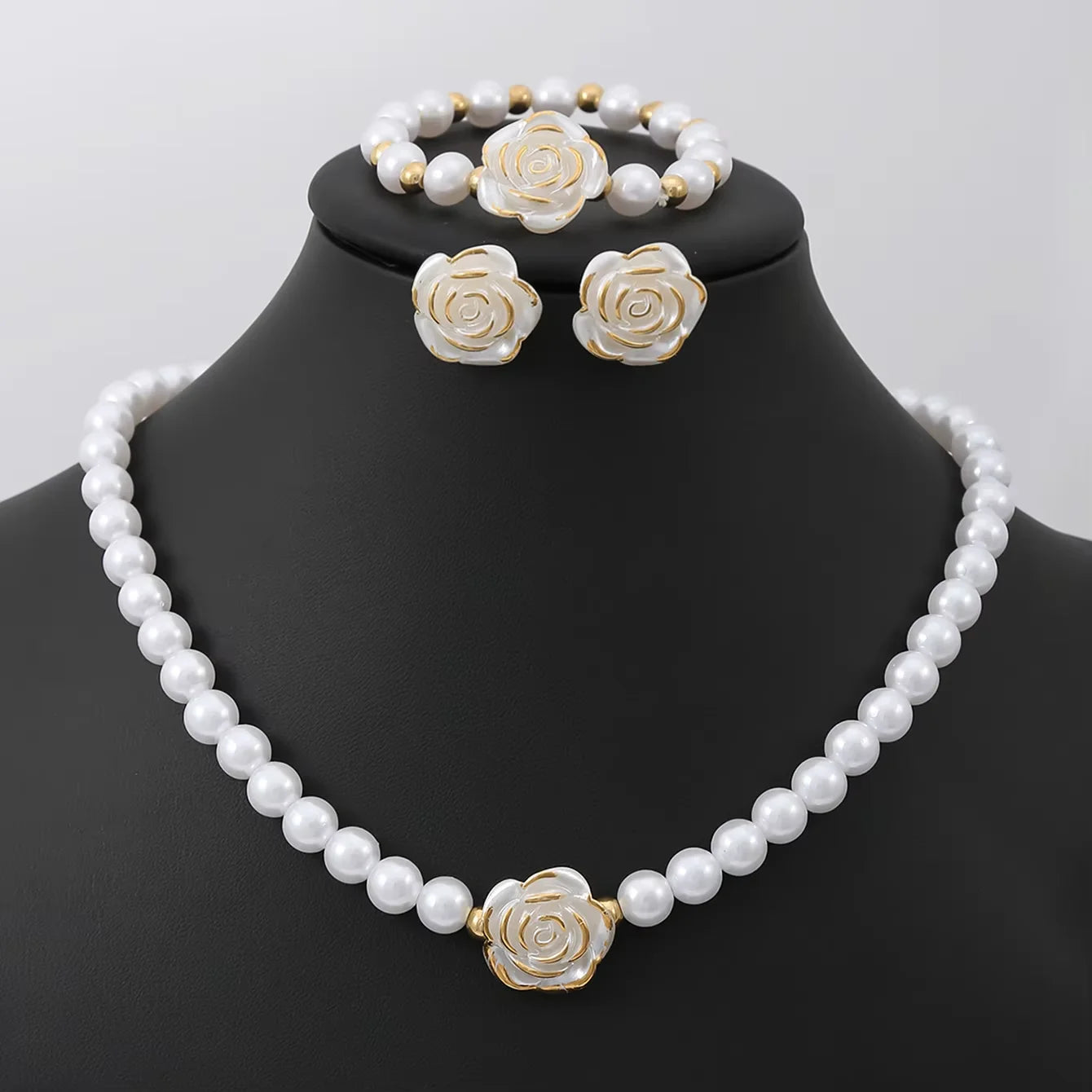 Elegant Pearl Flower Jewellery Set — Necklace, Bracelet & Earrings